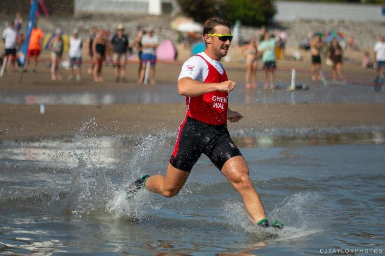Jerry Owen sprints from shore